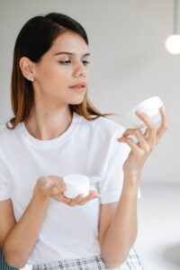 woman considering beauty products